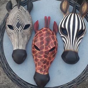 Lot of 3 wooden carved animal faces.